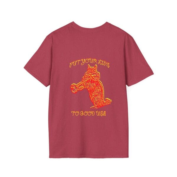 A maroon t-shirt featuring a stylized illustration of a fox holding an object in its mouth, accompanied by the text "Put Your Lips To Good Use.