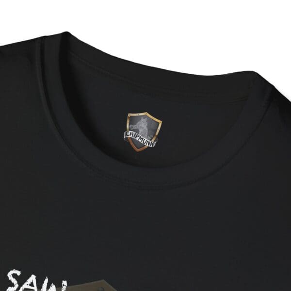 Close-up of the I Saw T-Shirt featuring a "Chipmunk" shield logo inside the collar.