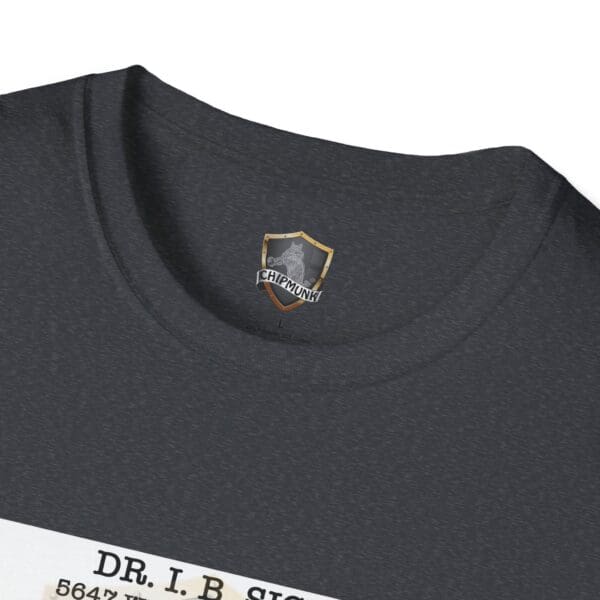 Close-up of a dark gray Laughter T-shirt with a small emblem featuring the word "Chipmunk" on the chest. Text partially visible at the bottom of the image.