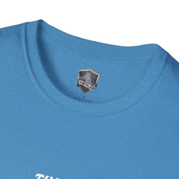 Close-up of The Man T-Shirt's blue collar featuring a "Chipmunk" logo and size label.