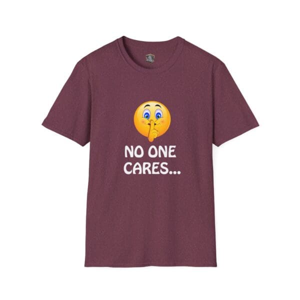 A maroon "No One Cares T-Shirt" featuring an emoji making a shushing gesture and the text "No one cares..." printed below.