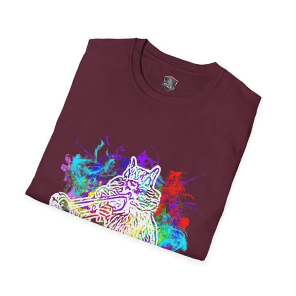 A folded maroon "Smoked Chipmunk T-Shirt" showcasing an eye-catching graphic of a cat playing the trumpet with vibrant abstract smoke swirling around it.