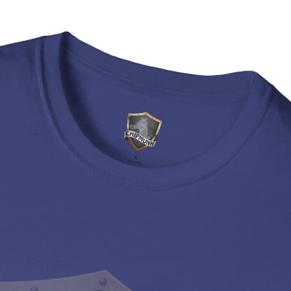 Close-up of a blue Chipmunk Brand T-Shirt featuring a neck label with a shield logo and the word "Chipmunk.