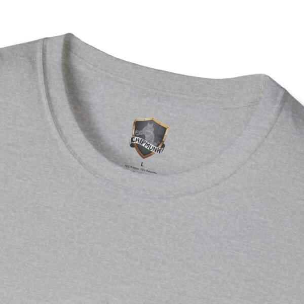 Close-up of a gray T-shirt collar with a "Your Story Is Not Mine to Tell" label.