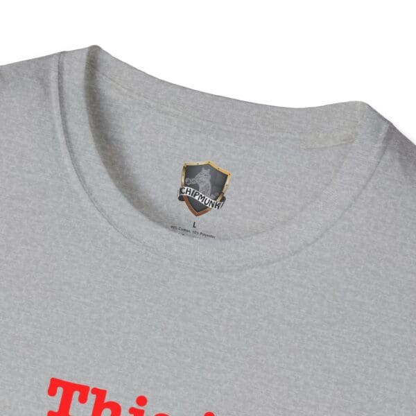 Close-up of a gray T-shirt featuring the "Chipmunk" label on the collar. Red text starting with "This is Your Brain on Hugs T-Shirt" is partially visible on the shirt.