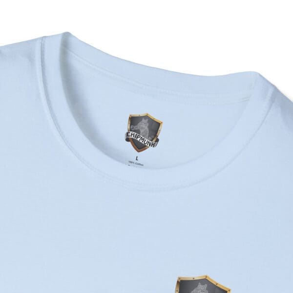 The Vacation T-Shirt is light blue, featuring a small shield emblem near the neckline and a larger one on the chest. It comes in size large and is made from 100% cotton.