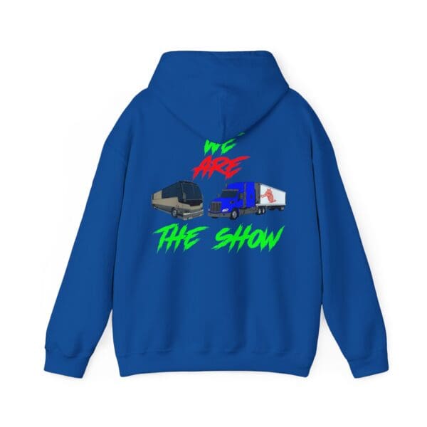 The Show Hoodie in blue, featuring images of a tour bus and truck, with the text "WE ARE THE SHOW" in vibrant colors above and below the vehicles.