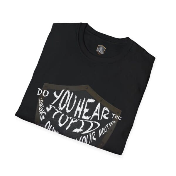 A folded black Hear The Stupid T-Shirt displays a shield design with the text: "Do you hear the stupid coming out of your mouth?