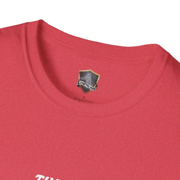 Close-up of the neckline of a red "The Man T-Shirt" featuring a "Chipmunk" logo shield on the inside label.