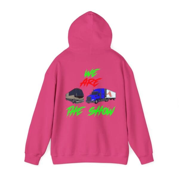 The Show Hoodie in pink features illustrations of a tour bus and truck, with the text "We Are The Show" displayed in bold, colorful letters.