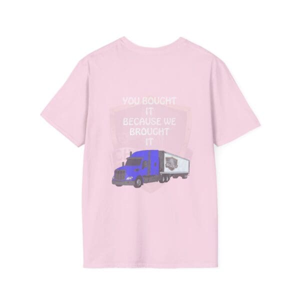 Pink t-shirt with a blue semi-truck and trailer graphic, displaying the text "YOU BOUGHT IT BECAUSE WE BROUGHT IT" above it.