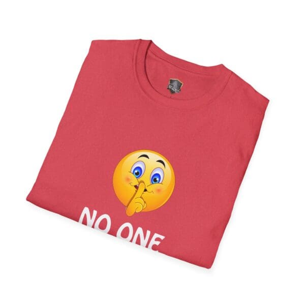 No One Cares T-Shirt featuring a shushing emoji with the text "NO ONE" underneath.