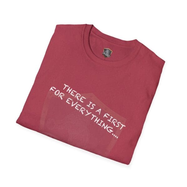 Red T-shirt, folded, featuring the text "THERE IS A FIRST FOR EVERYTHING..." on the front.