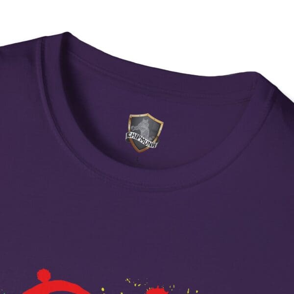 A close-up of the neckline of a Splash Chipmunk T-Shirt in purple, featuring a "Chipmunx" shield logo tag with a hint of red design peeking through at the bottom.