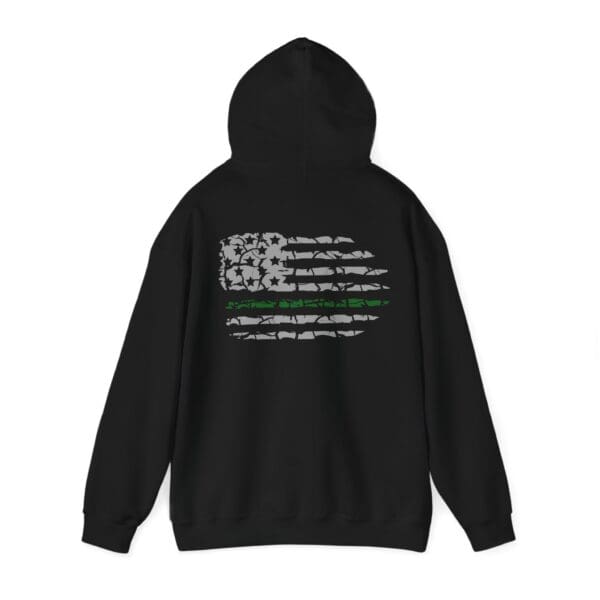 The Military Support Hoodie is a black hoodie adorned with a distressed American flag design and a green line across the back.