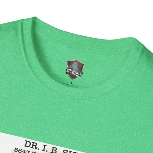 Close-up of a green Laughter T-Shirt featuring a small gray logo inside the collar labeled "Chipmunk." Black text on a white background at the bottom reads "Dr. I.B. Singh.