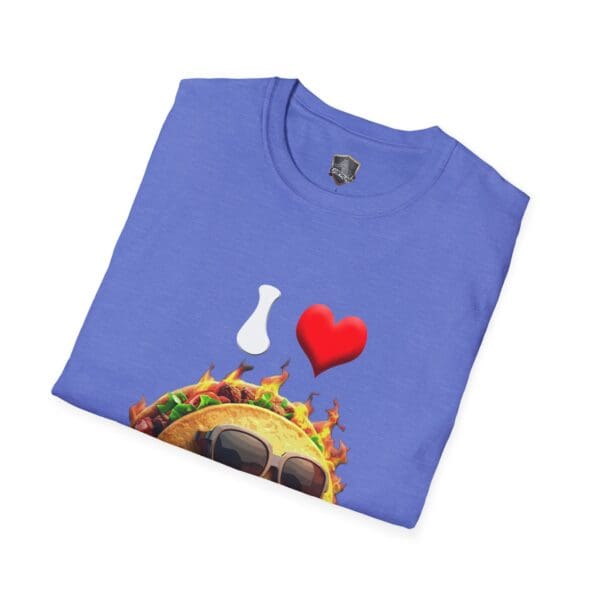 A folded blue "I Love Hot Taco T-Shirt" featuring a design of a taco wearing sunglasses, a heart emoji, and a white silhouette of a bottle.