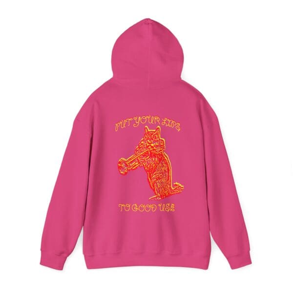 Pink hoodie featuring a yellow and orange graphic of a dog holding a megaphone, surrounded by the text "PUT YOUR $$$ TO GOOD USE," from the Put Your Lips To Good Use Hoodie collection.