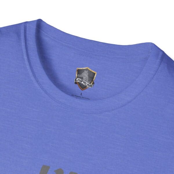 Close-up of the "I'm Nuts T-Shirt" in blue, featuring a label inside the collar. The label displays a shield logo, the word "Chipmunk," and indicates that the shirt is a size large and made of 85% recycled cotton.