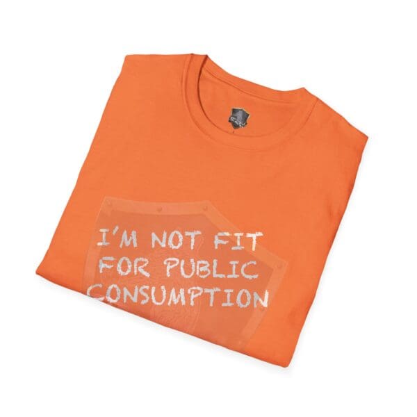 A neatly folded orange t-shirt featuring the text "I'm Not Fit for Public Consumption" in white on the front.