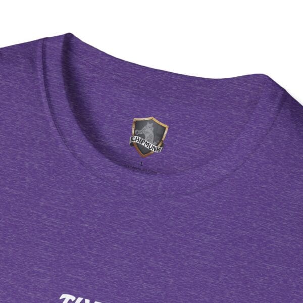 Close-up of the collar of The Man T-Shirt in purple, featuring the Chipmunk brand logo on the inside tag.