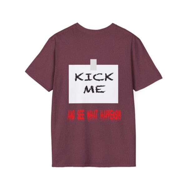 The back of the Kick Me T-shirt in maroon features a taped paper design with the text "KICK ME" in black and "AND SEE WHAT HAPPENS!!!" in red.