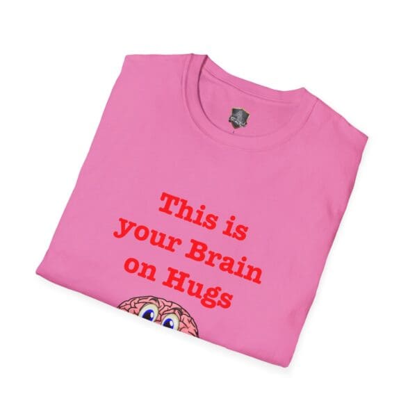 'This is Your Brain on Hugs' T-Shirt in pink, featuring the text "This is your Brain on Hugs" with a cartoon brain graphic beneath it.