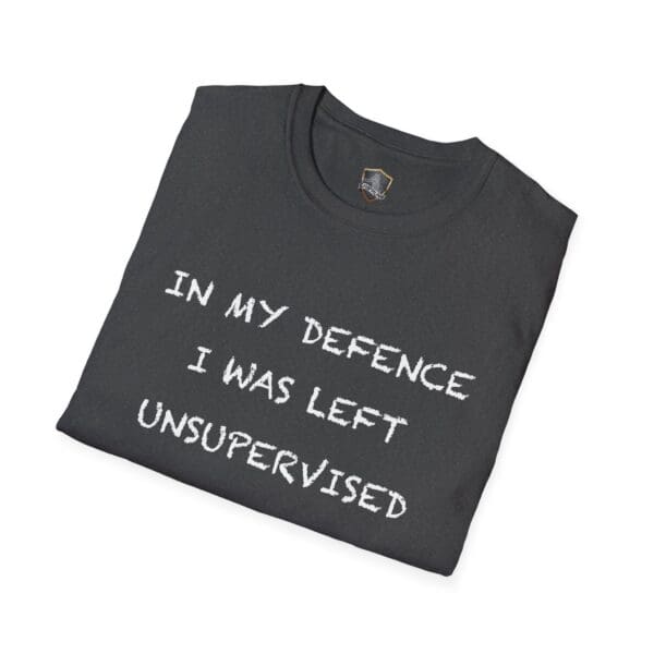 A black t-shirt featuring the text "IN MY DEFENCE I WAS LEFT UNSUPERVISED" from the Unsupervised Mischief T-Shirt collection.