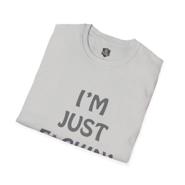 Folded gray "I'm Nuts T-Shirt" with partially visible text laid on a white background.