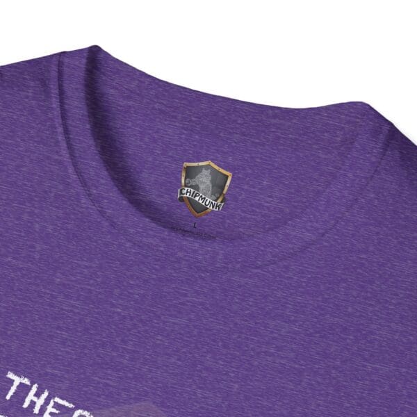 Close-up of a purple "There's a First for Everything... Except Impressions!" T-shirt with a small Chipmunk branded label inside the collar.