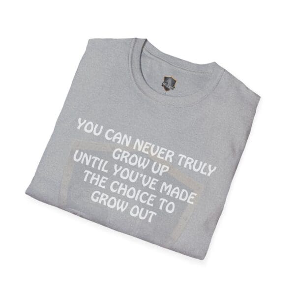 A folded gray 'You Can Never Truly Grow Up T-Shirt' with the text: "You can never truly grow up until you've made the choice to grow out.