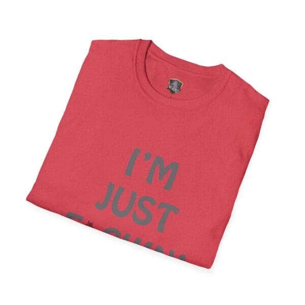 Folded red "I'm Nuts T-shirt" with a partially visible phrase "I'M JUST F-----G" in gray text on a white background.