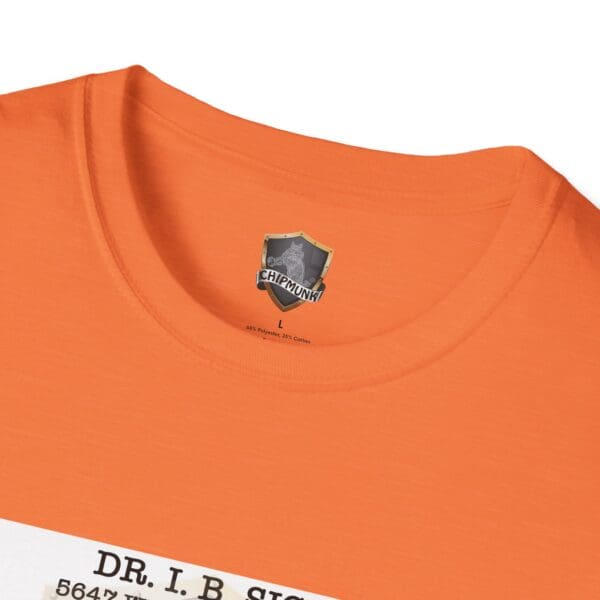 A close-up shot of an orange Laughter T-Shirt reveals a label inside the collar displaying the "Chipmunk" brand. The text visible on the shirt reads "Dr. I.B. Sig." in a tag-like design.