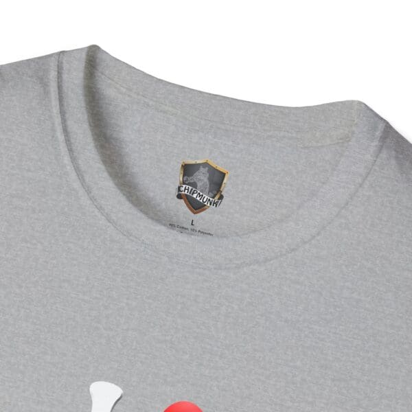 Close-up of a gray 'I Love Hot Taco' t-shirt with a collar tag displaying the 'Chipmunk' logo and brand name, featuring red and white graphics partially visible.