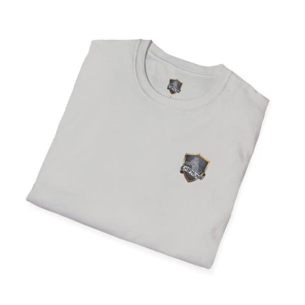 Vacation T-Shirt in white, featuring a folded design with a shield and sword emblem on the chest.