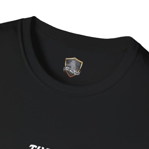 Close-up of the collar on The Man T-Shirt, featuring a Chipmunk logo and shield design printed inside in black.