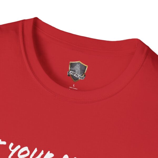 Close-up of a red Lunchbox Logic Tee with a Chipmunk brand label at the collar.