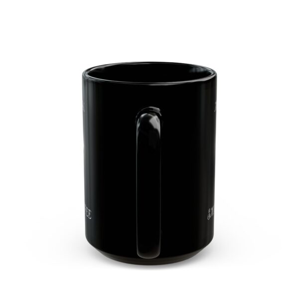 A black ceramic "My Spirit Animal Is a Chipmunk" coffee mug, with a glossy finish, is standing upright on a plain white background.